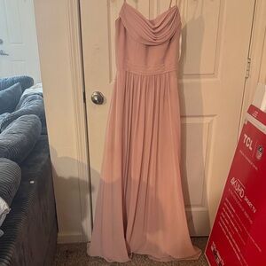 Prom dress that was made size two very comfortable…very like new.
